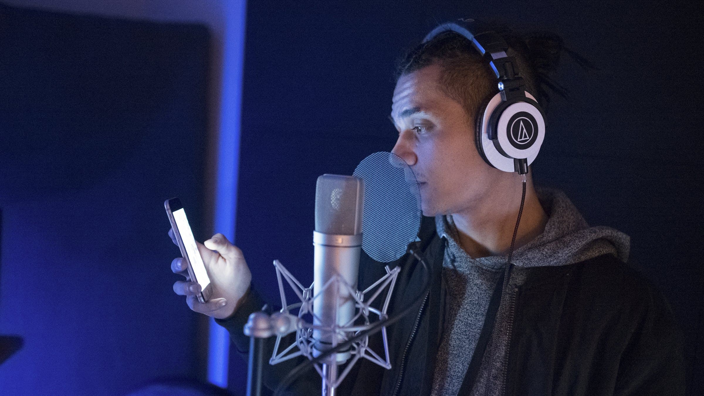 Bdice recording vocals in the studio